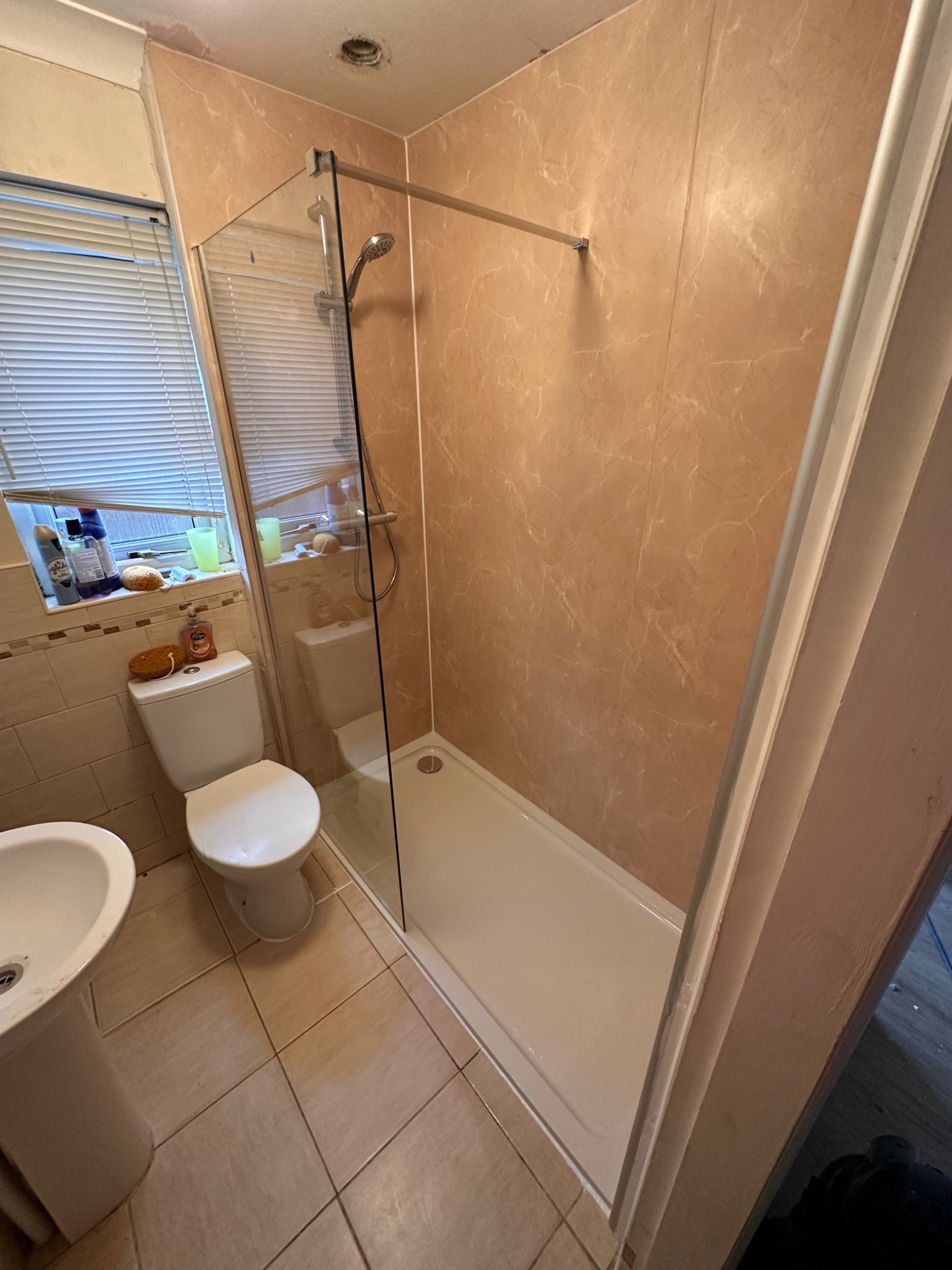 Completed walk-in shower bathroom transformation