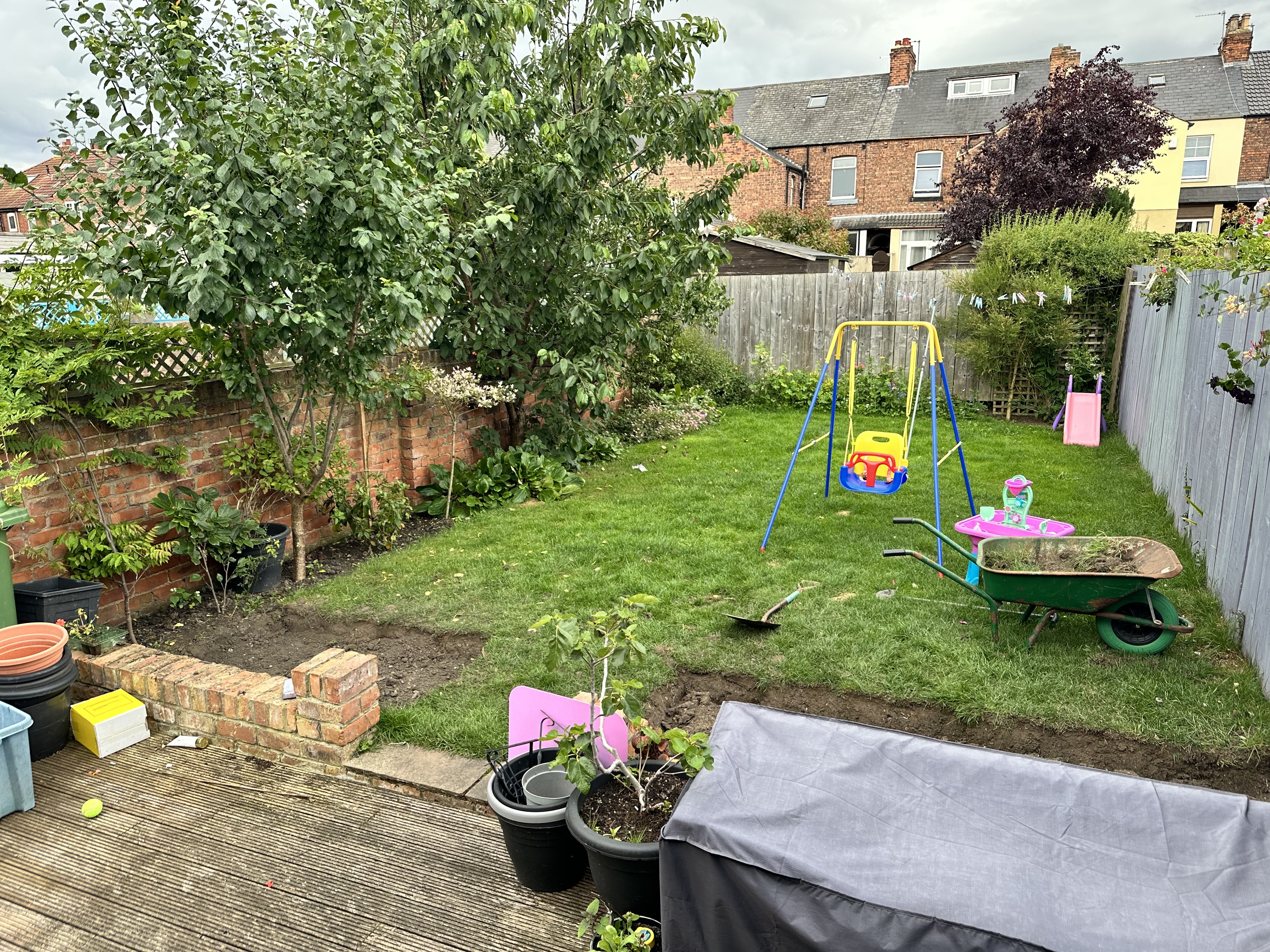 Garden and existing decking before refurbishment